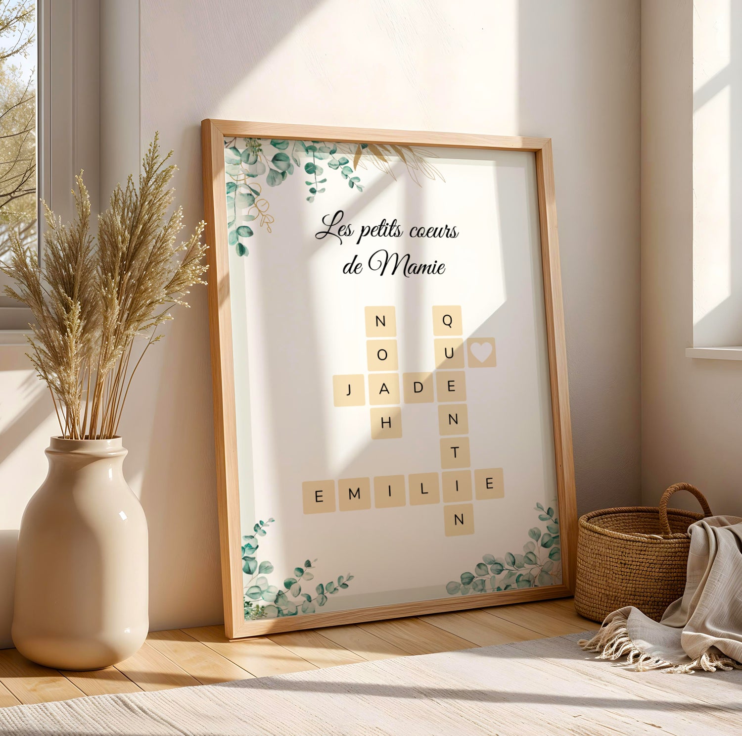 Affiche Mamie Personnalisée with Scrabble tiles and eucalyptus design for Fête des Grands-Mères in wooden frame.