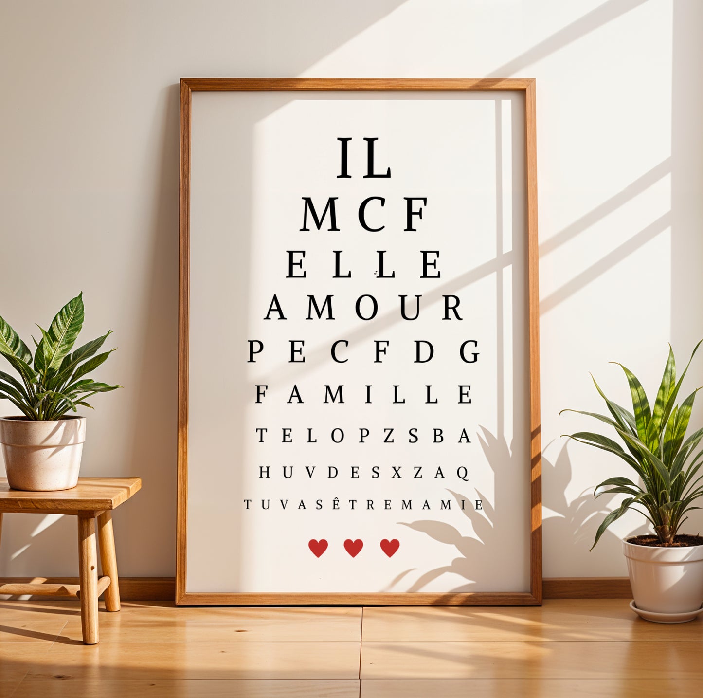 Affiche Mamie Personnalisée styled as eye test chart with words amour famille and three red hearts for Fête des Grands-Mères .