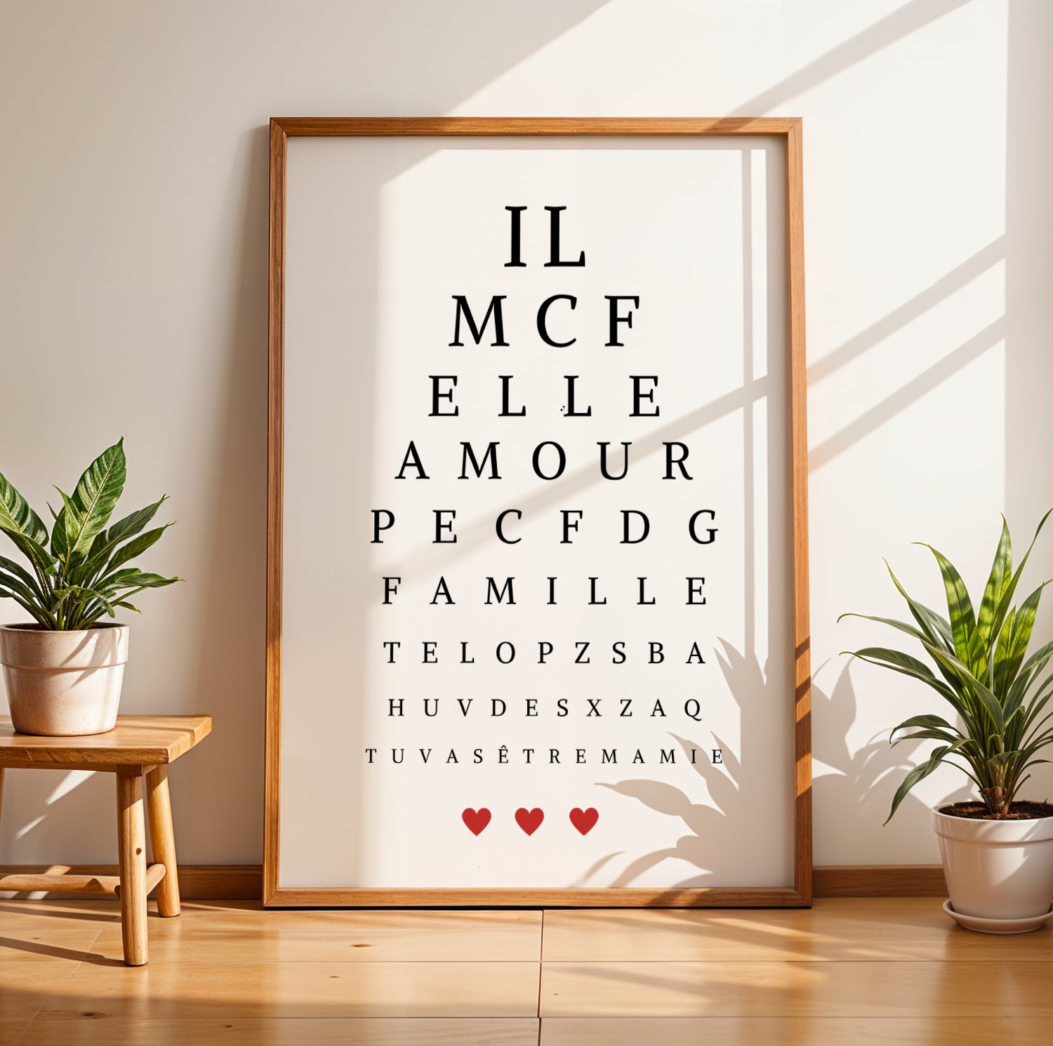 Affiche Mamie Personnalisée styled as eye test chart with words amour famille and three red hearts for Fête des Grands-Mères .