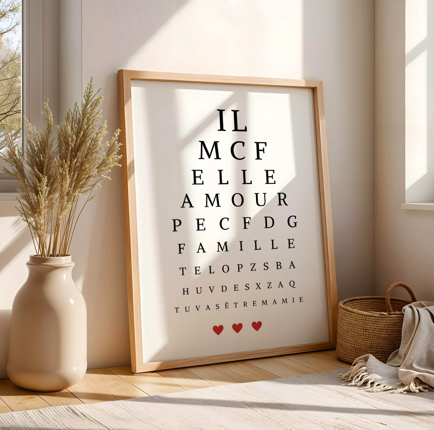 Minimalist eye test style poster with personalized Mamie message and red heart accents for Fête des Grands-Mères.