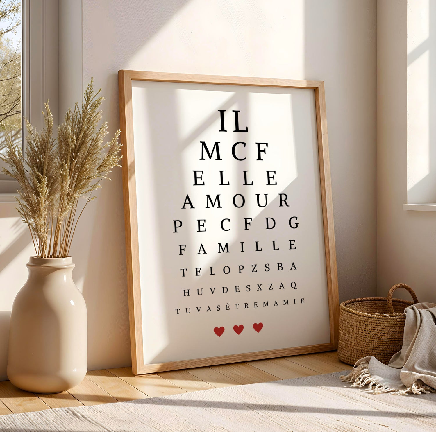Minimalist eye test style poster with personalized Mamie message and red heart accents for Fête des Grands-Mères.